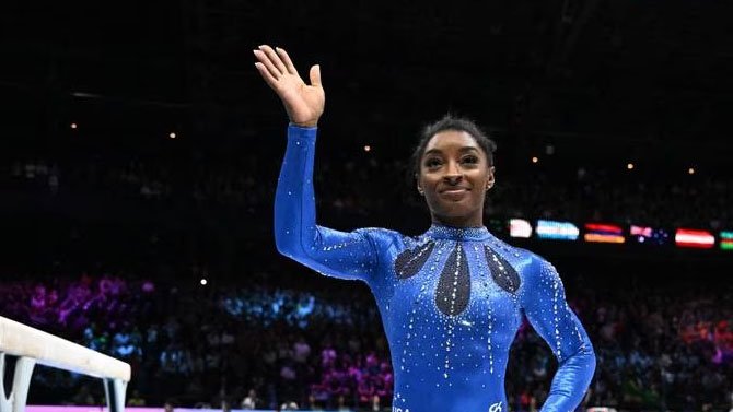 Simone Biles poses during the awards ceremony after winning the all-around division of the US Classic in Illinois. Reuters