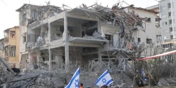 Iran attacks 10 sites in Israel, 11 injured