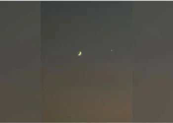 Crescent moon and Venus grace the evening sky over Sharjah